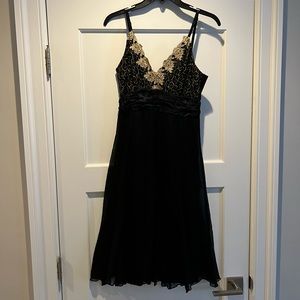 Black and gold, chiffon and satin, cocktail dress by Jonathan Martin